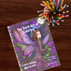A Dark Fantasy Coloring Book displayed on a wooden table with a cup of colored pencils